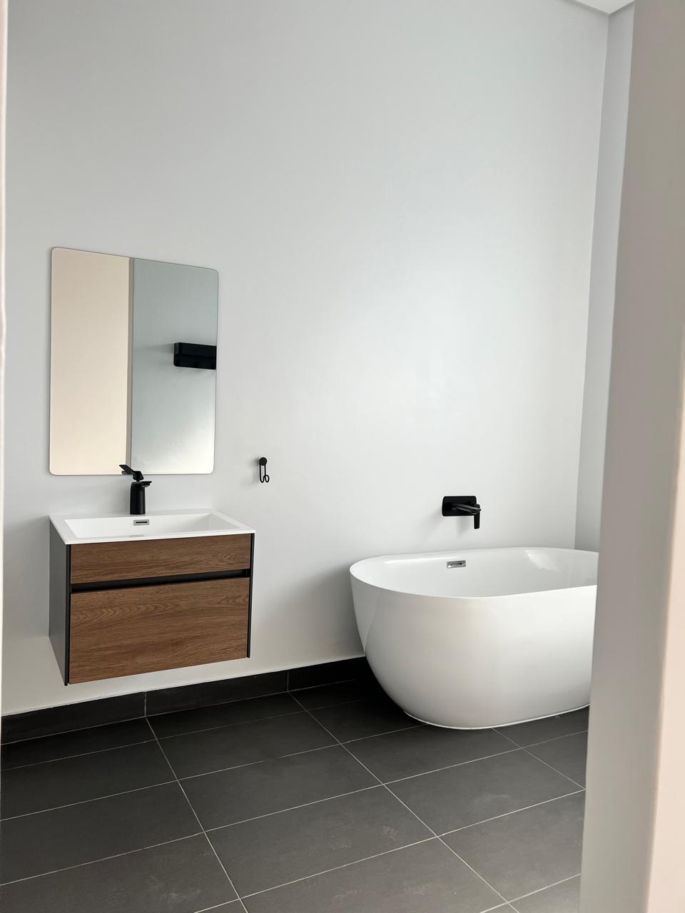 Bathroom vanity and freestanding bath &mdash; Luxury Home Renovation, Mazibuko Trading & Projects