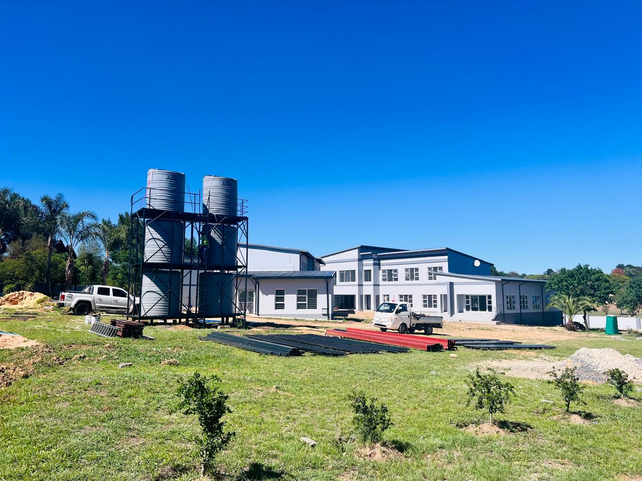Site overview with water tank installation &mdash; Multi-Unit Development Project, Mazibuko Trading & Projects
